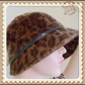 Bebe leopard fur hat